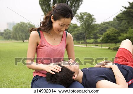 Togetherness, Young Men, Young Adult, Young Couple, Young Women, Asian Ethnicity View Large Photo Image Picture - Togetherness, Young Men, Young Adult, Young Couple, Young Women, Asian Ethnicity. Fotosearch