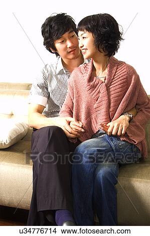 Picture - Togetherness, Young Men, Young Adult, Young Couple, Young Women, Asian Ethnicity. Fotosearch