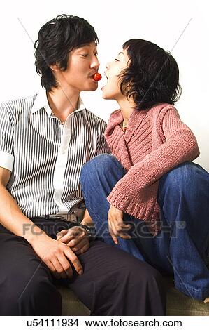 Togetherness, Young Men, Young Adult, Young Couple, Young Women, Asian Ethnicity View Large Photo Image Picture - Togetherness, Young Men, Young Adult, Young Couple, Young Women, Asian Ethnicity. Fotosearch