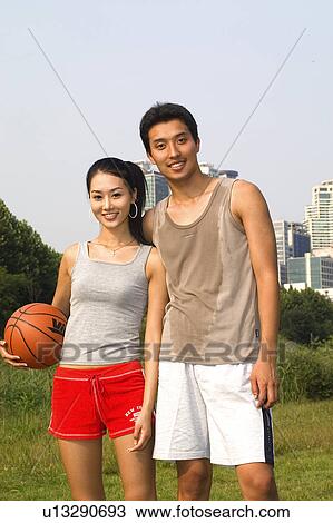 Togetherness, Young Men, Young Adult, Young Couple, Young Women, Asian Ethnicity View Large Photo Image Stock Image - Togetherness, Young Men, Young Adult, Young Couple, Young Women, Asian Ethnicity. Fotosearch