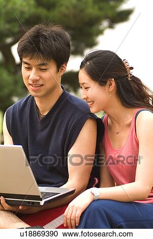 Togetherness, Young Men, Young Adult, Young Couple, Young Women, Asian Ethnicity View Large Photo Image Stock Image - Togetherness, Young Men, Young Adult, Young Couple, Young Women, Asian Ethnicity. Fotosearch