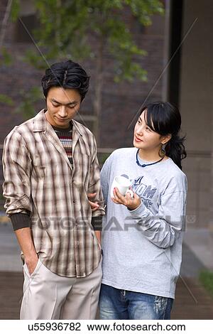 Togetherness, Young Men, Young Adult, Young Couple, Young Women, Asian Ethnicity View Large Photo Image Stock Image - Togetherness, Young Men, Young Adult, Young Couple, Young Women, Asian Ethnicity. Fotosearch