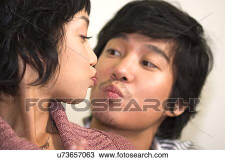 Togetherness, Young Men, Young Adult, Young Couple, Young Women, Asian Ethnicity View Large Photo Image Stock Image - Togetherness, Young Men, Young Adult, Young Couple, Young Women, Asian Ethnicity. Fotosearch