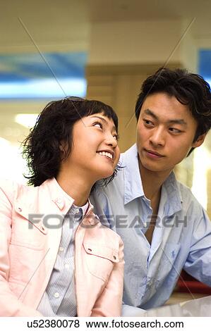 Togetherness, Young Men, Young Adult, Young Couple, Young Women, Asian Ethnicity View Large Photo Image Stock Photo - Togetherness, Young Men, Young Adult, Young Couple, Young Women, Asian Ethnicity. Fotosearch