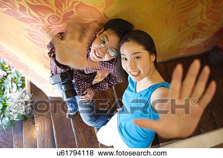 Togetherness, Young Men, Young Adult, Young Couple, Young Women, Asian Ethnicity View Large Photo Image Stock Photo - Togetherness, Young Men, Young Adult, Young Couple, Young Women, Asian Ethnicity. Fotosearch