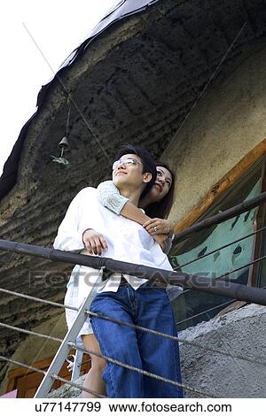 Stock Photo - Togetherness, Young Men, Young Adult, Young Couple, Young Women, Asian Ethnicity. Fotosearch