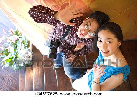 Togetherness, Young Men, Young Adult, Young Couple, Young Women, Asian Ethnicity View Large Photo Image Stock Photography - Togetherness, Young Men, Young Adult, Young Couple, Young Women, Asian Ethnicity. Fotosearch