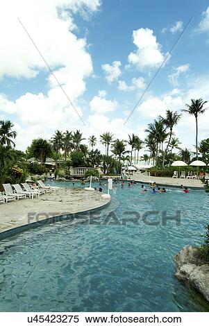 Stock Photography - Travel Destinations, Beach, Cloud, Sky, Tourist Resort, Tourism, Swimming Pool. Fotosearch