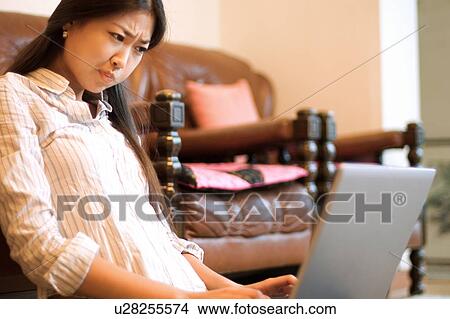 Picture - Wireless Technology, Mobile Phone, Laptop, Connected, New Age, Happiness, Youth. Fotosearch