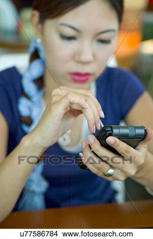 Picture - Wireless Technology, Mobile Phone, Laptop, Connected, New Age, Happiness, Youth. Fotosearch