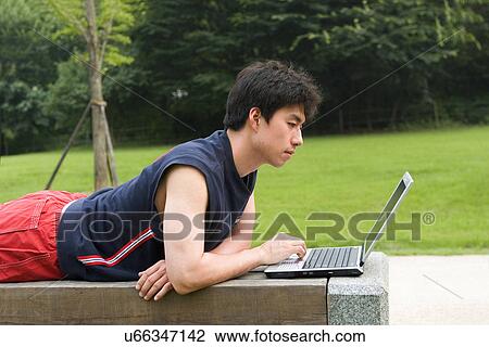 Wireless Technology, Mobile Phone, Laptop, Connected, New Age, Happiness, Youth View Large Photo Image Stock Image - Wireless Technology, Mobile Phone, Laptop, Connected, New Age, Happiness, Youth. Fotosearch
