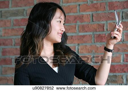 Wireless Technology, Mobile Phone, Laptop, Connected, New Age, Happiness, Youth View Large Photo Image Stock Image - Wireless Technology, Mobile Phone, Laptop, Connected, New Age, Happiness, Youth. Fotosearch