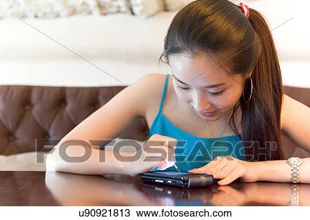 Wireless Technology, Mobile Phone, Laptop, Connected, New Age, Happiness, Youth View Large Photo Image Stock Image - Wireless Technology, Mobile Phone, Laptop, Connected, New Age, Happiness, Youth. Fotosearch