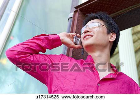 Stock Photography - Wireless Technology, Mobile Phone, Laptop, Connected, New Age, Happiness, Youth. Fotosearch