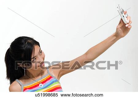Wireless Technology, Mobile Phone, Laptop, Connected, New Age, Happiness, Youth View Large Photo Image Stock Photography - Wireless Technology, Mobile Phone, Laptop, Connected, New Age, Happiness, Youth. Fotosearch