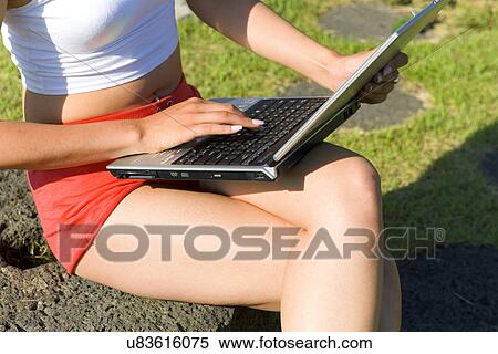 Stock Photography - Wireless Technology, Mobile Phone, Laptop, Connected, New Age, Happiness, Youth. Fotosearch