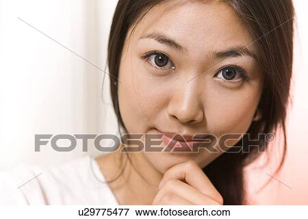 Stock Photo - Woman, Female, Portrait, Smiling, Outdoors, Day, Lifestyles. Fotosearch