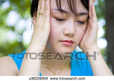 Stock Photo - Woman, Female, Portrait, Smiling, Outdoors, Day, Lifestyles. Fotosearch