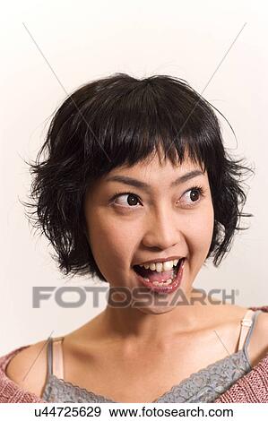 Stock Photo - Woman, Female, Portrait, Smiling, Outdoors, Day, Lifestyles. Fotosearch