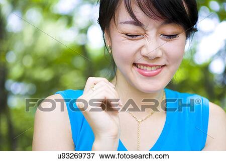 Stock Photo - Woman, Female, Portrait, Smiling, Outdoors, Day, Lifestyles. Fotosearch