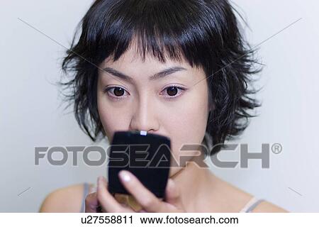 Stock Image - Young Adult, Make-Up, Cosmetics, Beauty Treatment, Therapy, Body Conscious, Body Care. Fotosearch