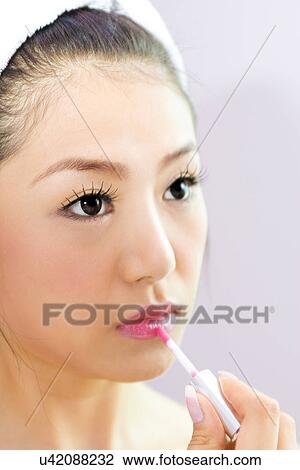 Young Adult, Make-Up, Cosmetics, Beauty Treatment, Therapy, Body Conscious, Body Care View Large Photo Image Stock Image - Young Adult, Make-Up, Cosmetics, Beauty Treatment, Therapy, Body Conscious, Body Care. Fotosearch