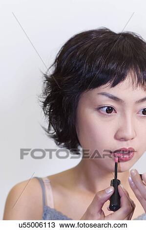 Stock Image - Young Adult, Make-Up, Cosmetics, Beauty Treatment, Therapy, Body Conscious, Body Care. Fotosearch