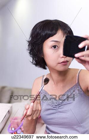 Stock Photo - Young Adult, Make-Up, Cosmetics, Beauty Treatment, Therapy, Body Conscious, Body Care. Fotosearch