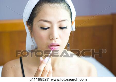 Stock Photo - Young Adult, Make-Up, Cosmetics, Beauty Treatment, Therapy, Body Conscious, Body Care. Fotosearch
