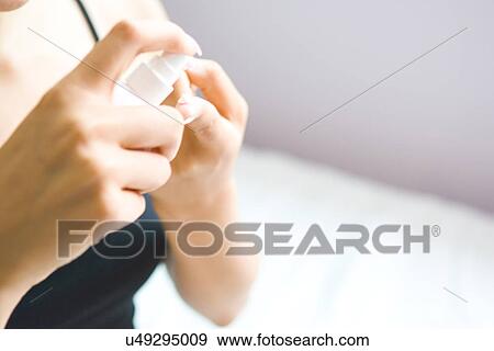 Stock Photo - Young Adult, Make-Up, Cosmetics, Beauty Treatment, Therapy, Body Conscious, Body Care. Fotosearch