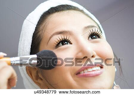 Stock Photo - Young Adult, Make-Up, Cosmetics, Beauty Treatment, Therapy, Body Conscious, Body Care. Fotosearch