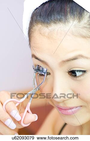 Stock Photo - Young Adult, Make-Up, Cosmetics, Beauty Treatment, Therapy, Body Conscious, Body Care. Fotosearch