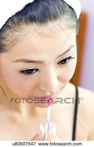 Young Adult, Make-Up, Cosmetics, Beauty Treatment, Therapy, Body Conscious, Body Care View Large Photo Image Stock Photo - Young Adult, Make-Up, Cosmetics, Beauty Treatment, Therapy, Body Conscious, Body Care. Fotosearch