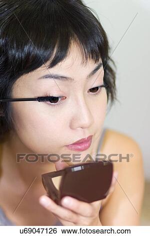 Stock Photograph - Young Adult, Make-Up, Cosmetics, Beauty Treatment, Therapy, Body Conscious, Body Care. Fotosearch