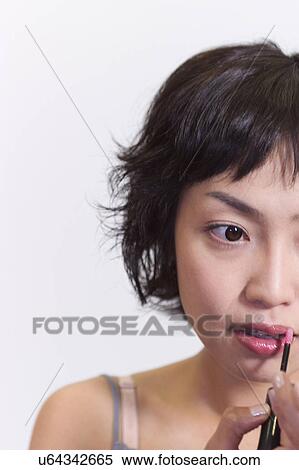 Stock Photography - Young Adult, Make-Up, Cosmetics, Beauty Treatment, Therapy, Body Conscious, Body Care. Fotosearch