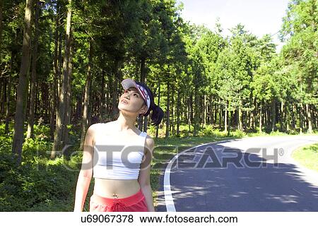 Young Adult, Young Men, Young Women, Outdoors, Sports Clothing, Athletic, Healthy Lifestyle View Large Photo Image Stock Photo - Young Adult, Young Men, Young Women, Outdoors, Sports Clothing, Athletic, Healthy Lifestyle. Fotosearch