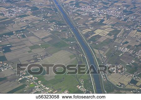 Aerial view of canal and cultivated land near Venice, Italy View Large Photo Image Stock Photo - Aerial view of canal and cultivated land near Venice, Italy. Fotosearch