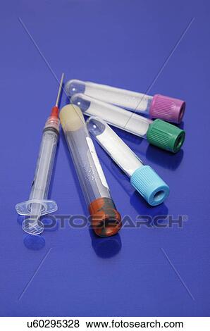 Stock Photo - Blood collection kit: Syringe and color coded vacutainer blood collection tubes. Fotosearch
