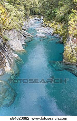 Blue pools of Haast Pass, Mount Aspiring National Park, South Island, new Zealand View Large Photo Image Stock Image - Blue pools of Haast Pass, Mount Aspiring National Park, South Island, new Zealand. Fotosearch