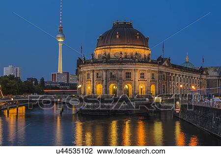 Stock Image - Bode Museum on Museum Island with Spree River in foreground and TV Tower in background, Berlin, Germany. Fotosearch