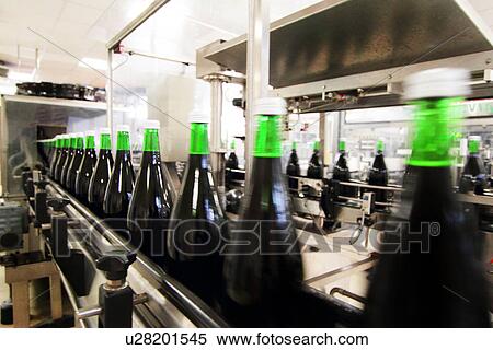 Bottling machine in industrial wine cellar View Large Photo Image Stock Photography - Bottling machine in industrial wine cellar. Fotosearch