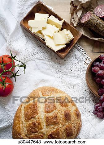 Bread, cheese, salami, grapes and tomatoes View Large Photo Image Stock Photo - Bread, cheese, salami, grapes and tomatoes. Fotosearch