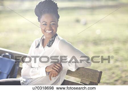 Business woman on park bench View Large Photo Image Stock Photo - Business woman on park bench. Fotosearch