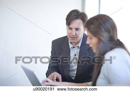 Businesspeople having meeting View Large Photo Image Stock Image - Businesspeople having meeting. Fotosearch