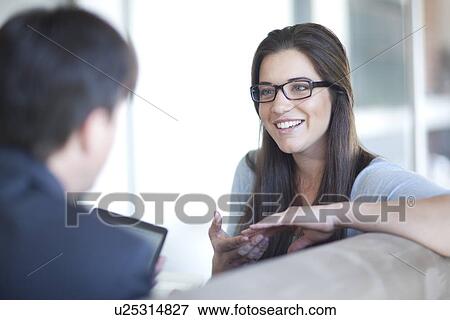 Businesspeople having meeting View Large Photo Image Stock Photo - Businesspeople having meeting. Fotosearch