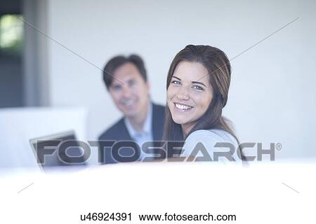 Businesspeople using laptop View Large Photo Image Stock Image - Businesspeople using laptop. Fotosearch