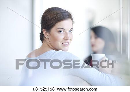 Businesswoman holding cup of tea View Large Photo Image Stock Photo - Businesswoman holding cup of tea. Fotosearch