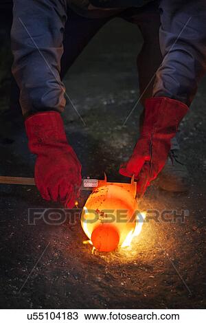 Checking diameter of a still red hot flaming crank shaft with a vernier View Large Photo Image Stock Image - Checking diameter of a still red hot flaming crank shaft with a vernier. Fotosearch