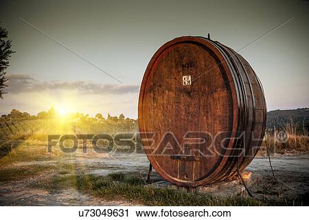 Stock Image - Chianti in wooden vat, Siena, Valle Orcia, Tuscany, Italy. Fotosearch