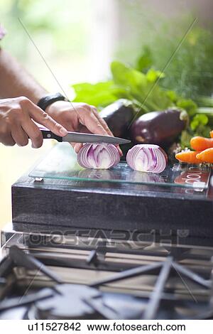 Chopped composition, hand chopping red onion View Large Photo Image Stock Image - Chopped composition, hand chopping red onion. Fotosearch